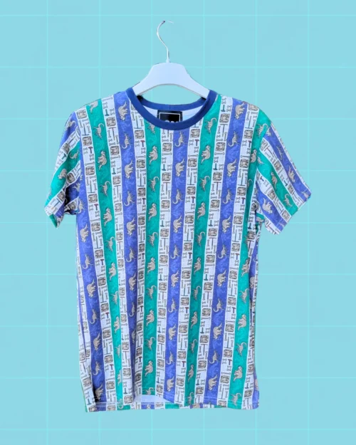 Polera de dinosaurio azul y verde